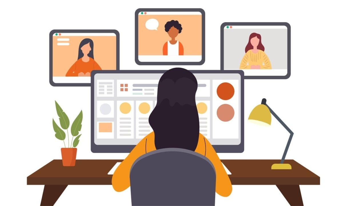 An illustration of a virtual work environment showcasing remote workers collaborating.