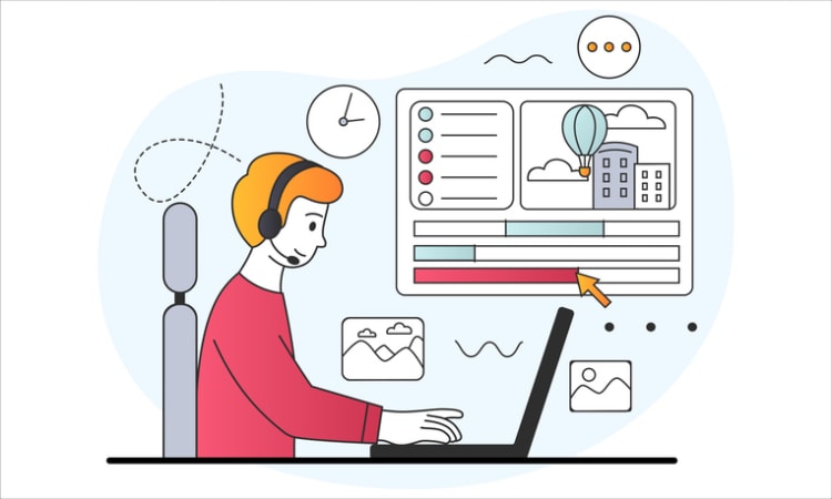 Person at desk with headset and charts on screen, representing screen recording tools and digital collaboration.