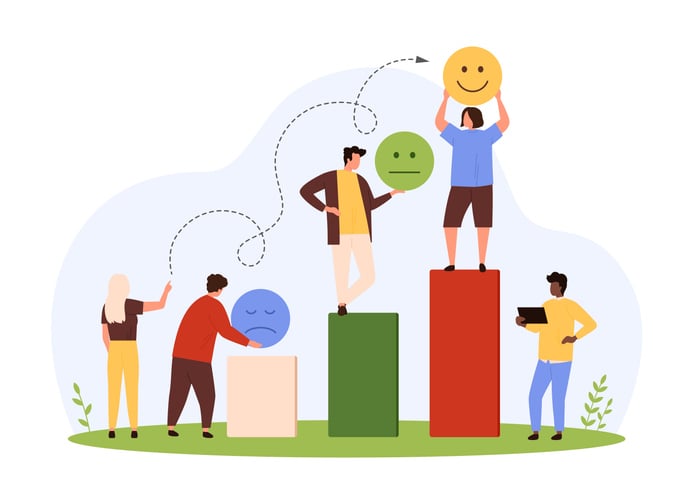 Illustration of people interacting with emotional blocks and emojis—symbolizing customer KPIs such as satisfaction, retention, and sentiment analysis used to measure customer experience and loyalty.