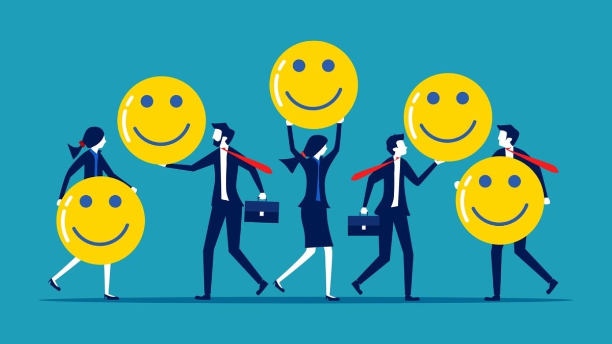 An image illustrating a positive company culture with employees collaborating in a supportive work environment, showcasing ways to boost morale.