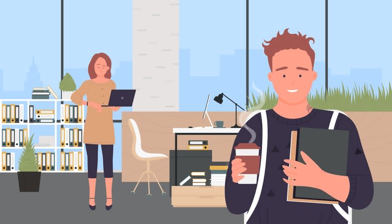 young man holding paper cup of coffee